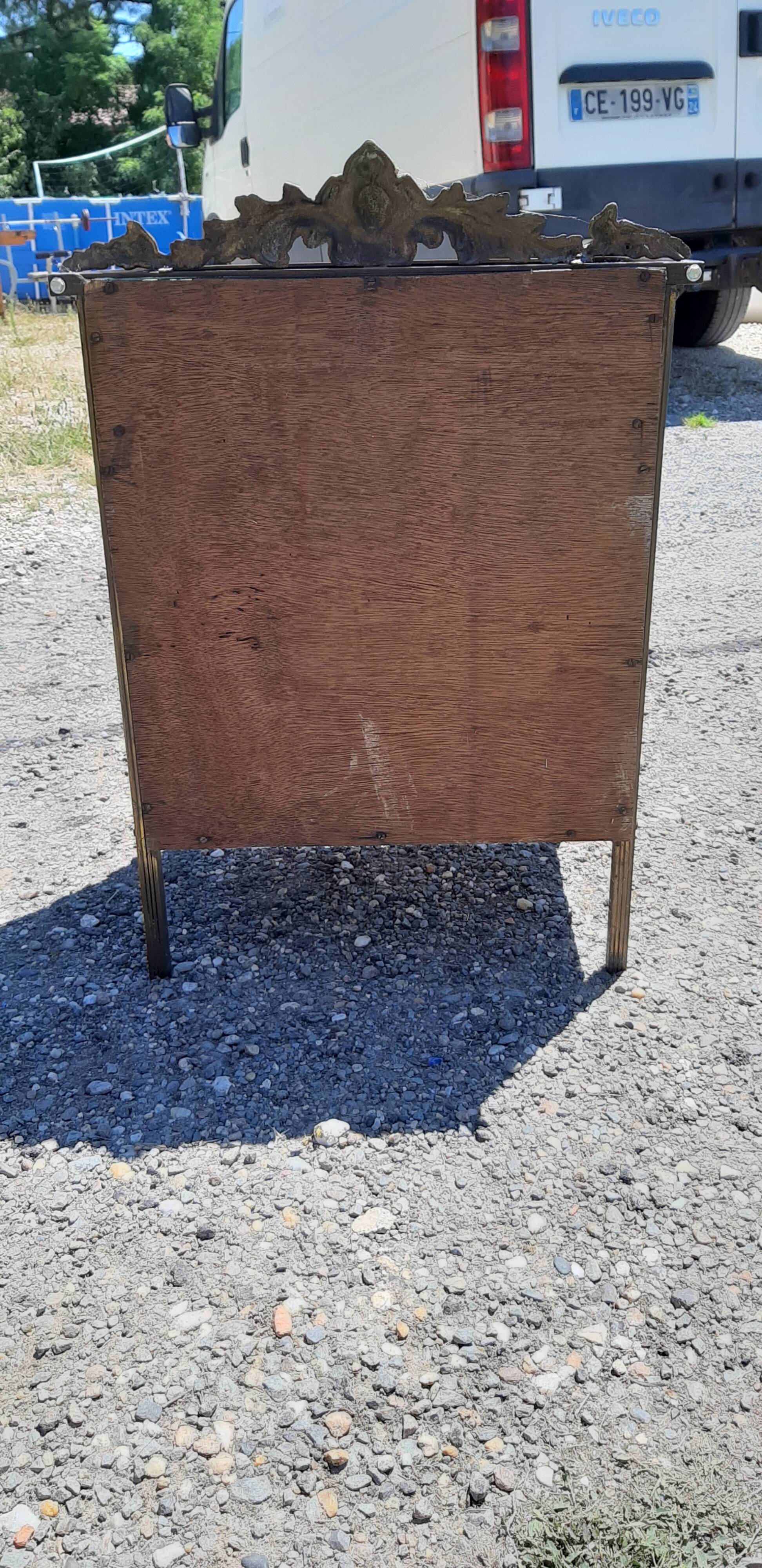 Golden metal empire style bedside