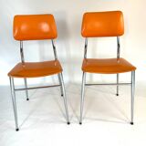 Pair of vintage orange leatherette chairs