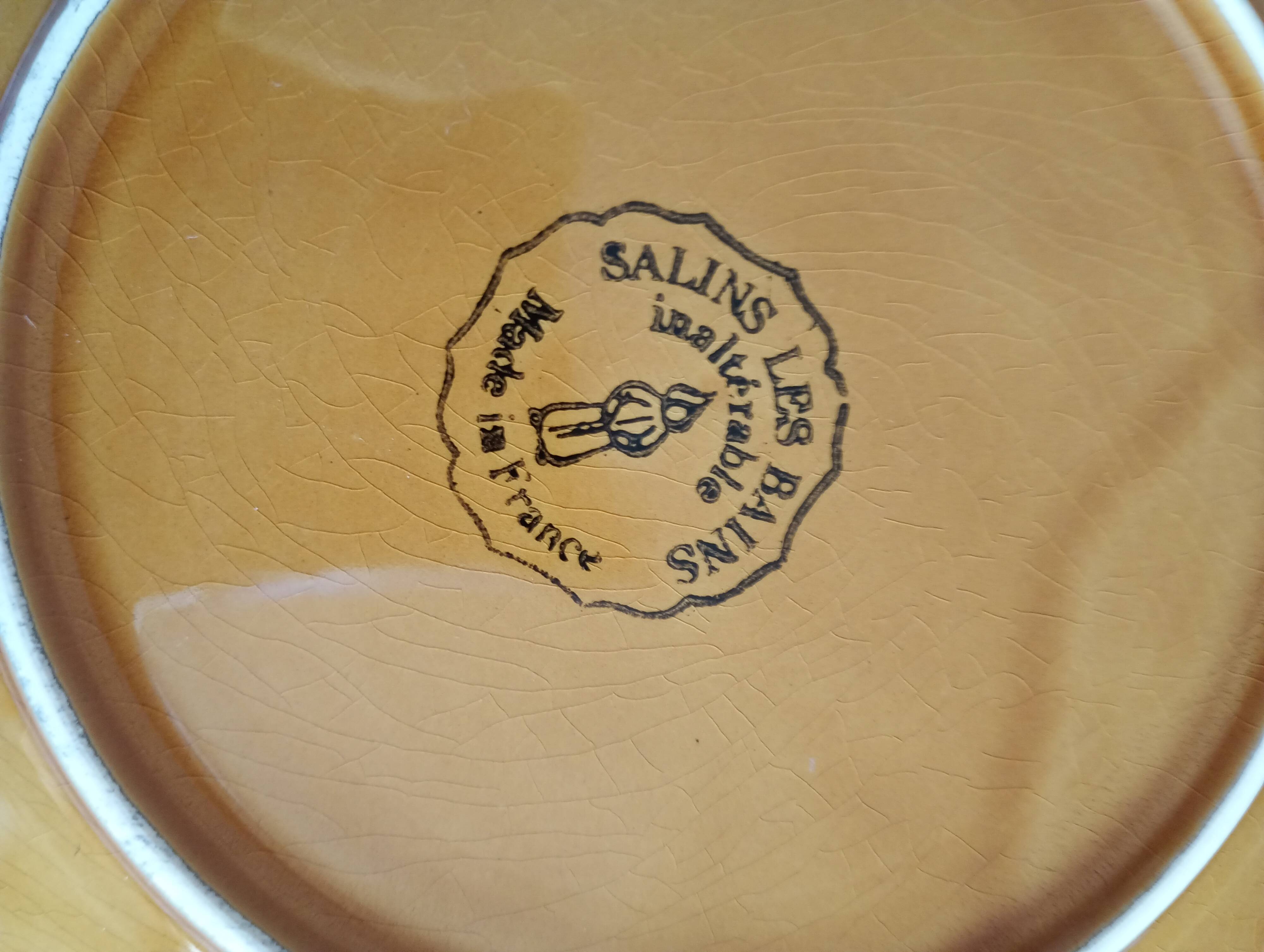 12 dessert plates and deep dishes from Salins-les-Bains, France.