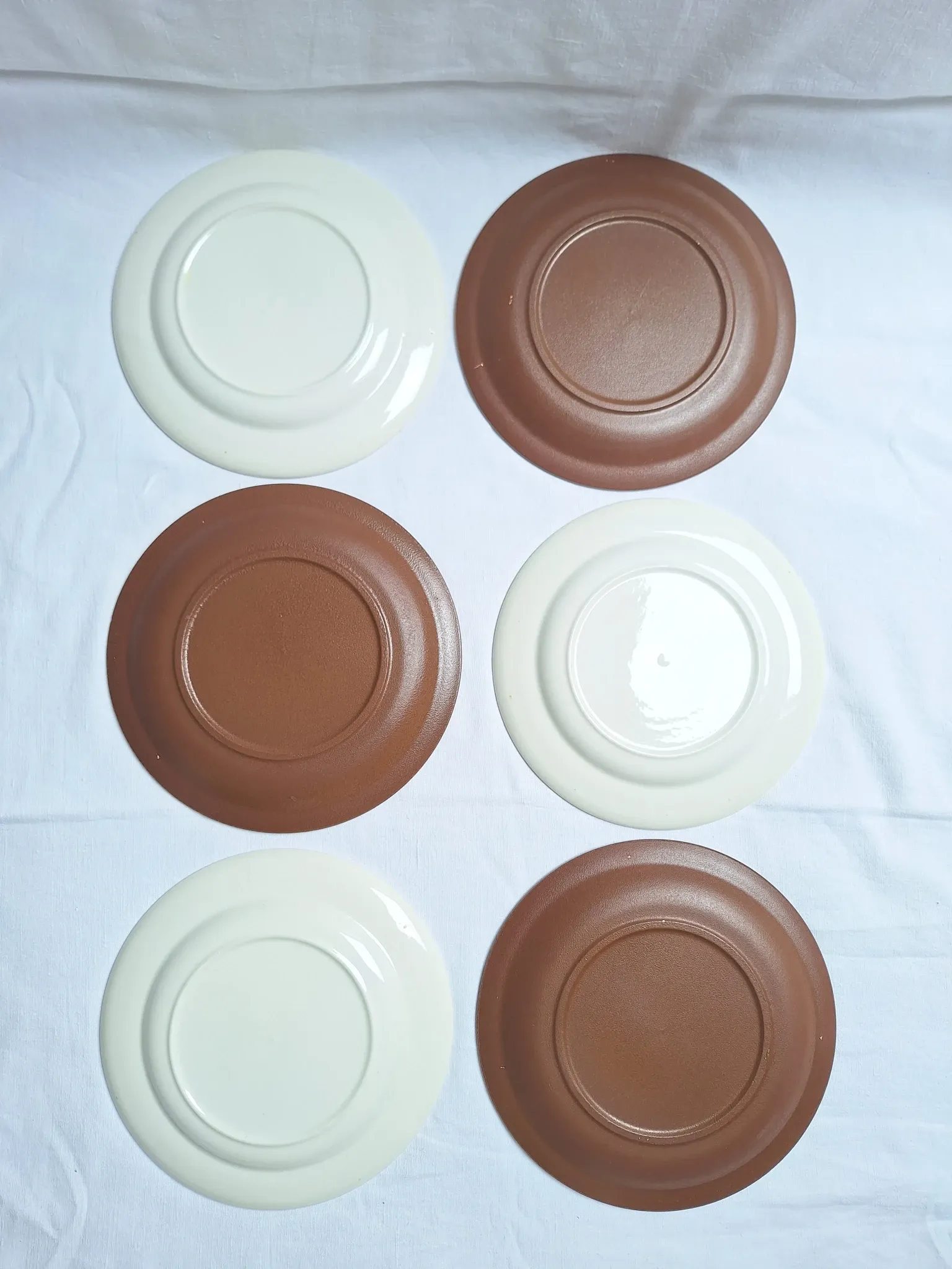 Brown flower-patterned plates from the 1970s.