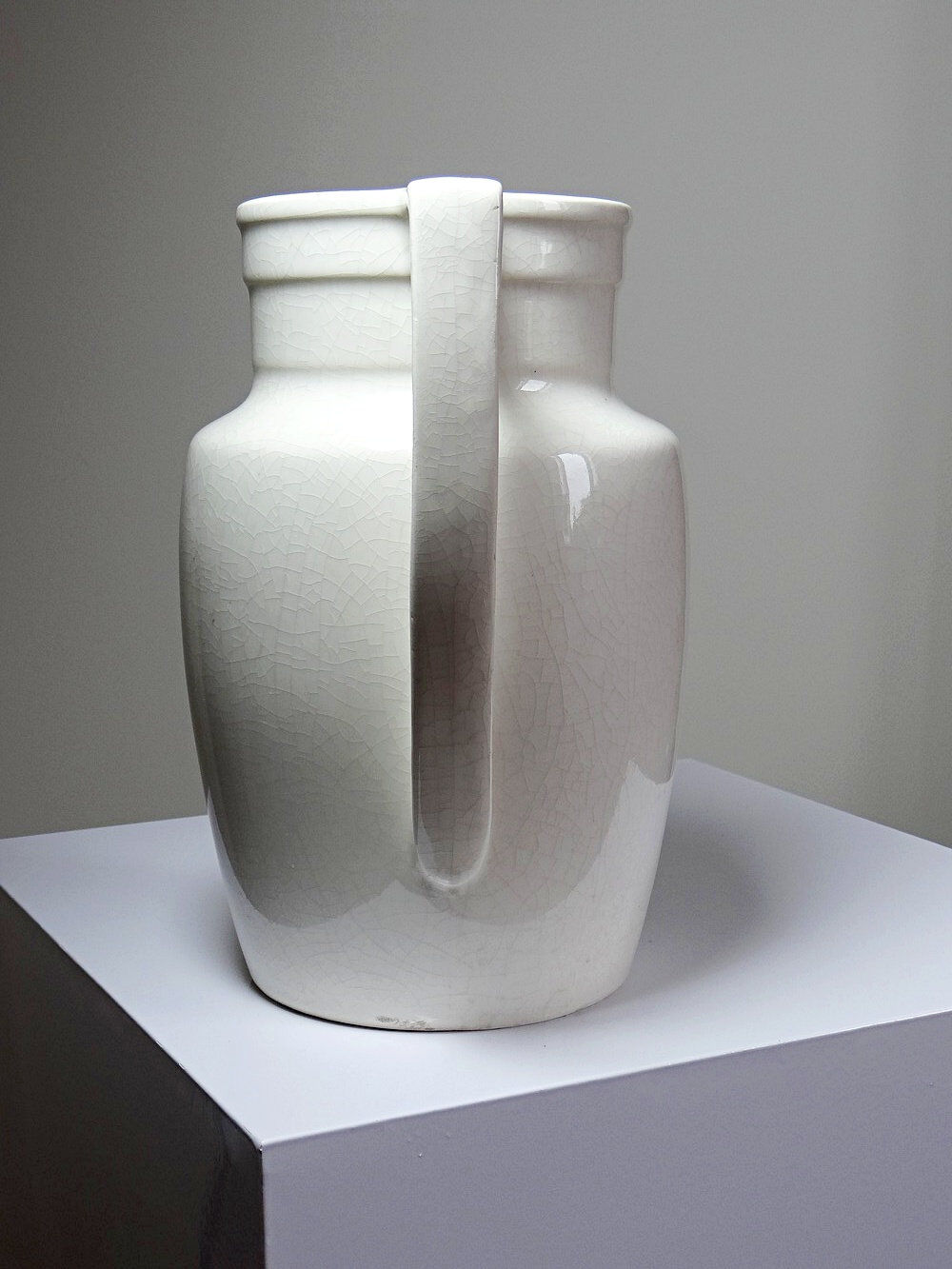 Large Art Deco toilet bowl, antique cracked faience.