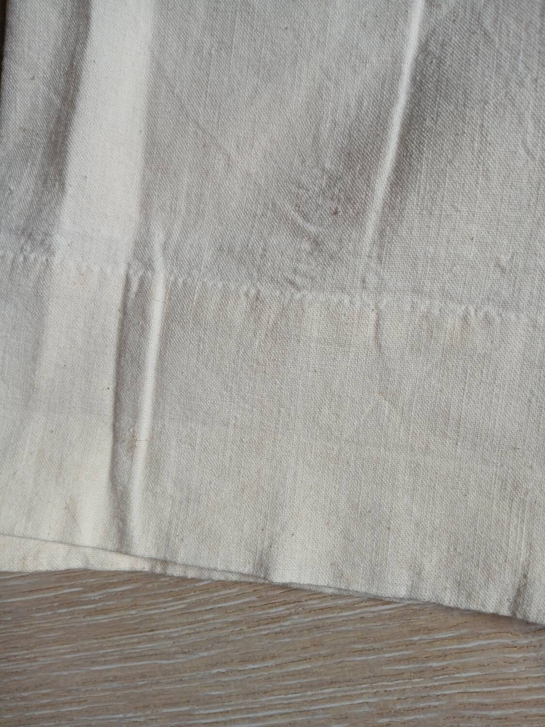 Antique sheet with embroidered initials