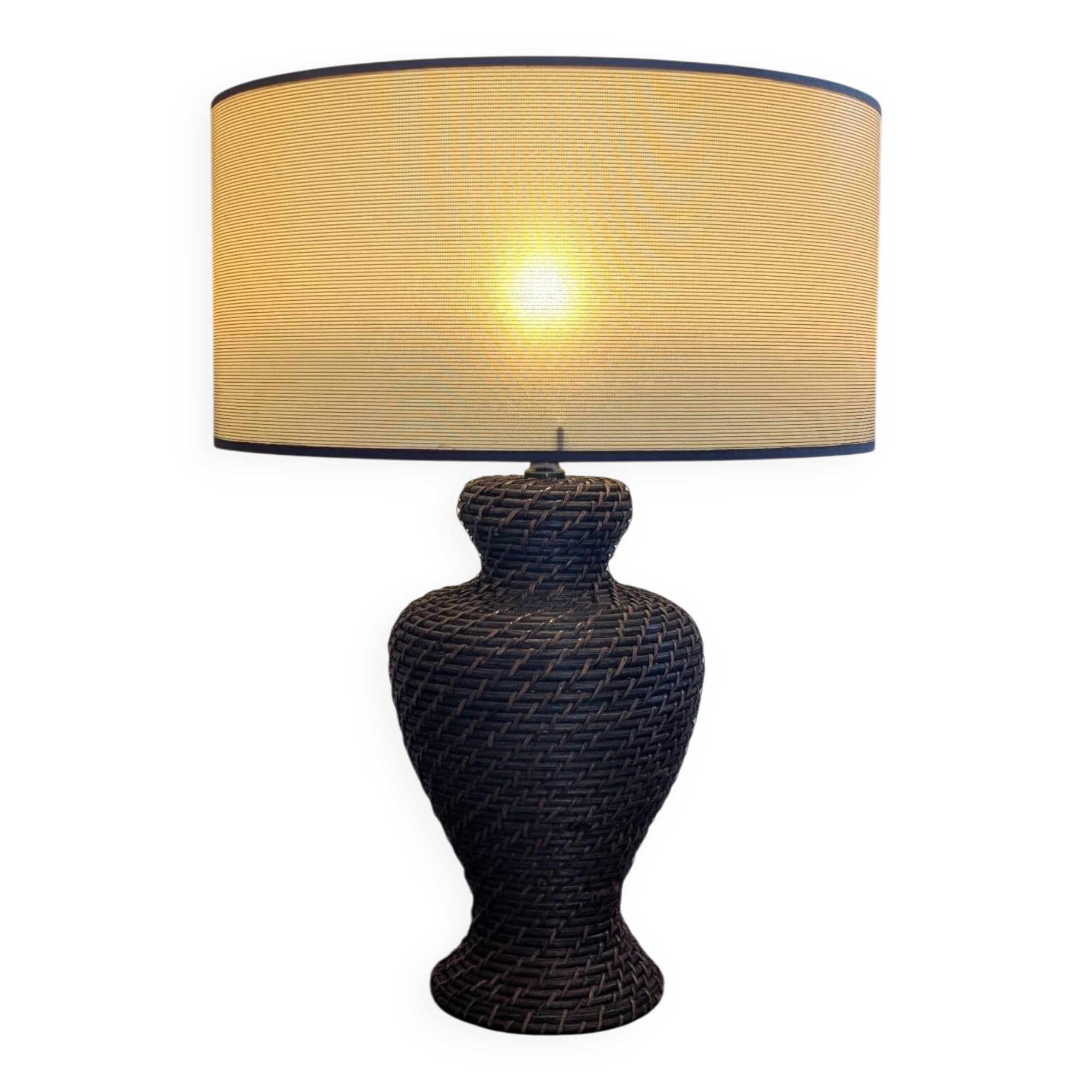Vintage lamp in brown rattan with textured lampshade.