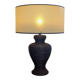 Vintage lamp in brown rattan with textured lampshade.