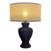 Vintage lamp in brown rattan with textured lampshade.