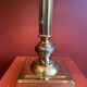 Lamp base in gilded brass, oval silk lampshade with a checkered pattern in burgundy.