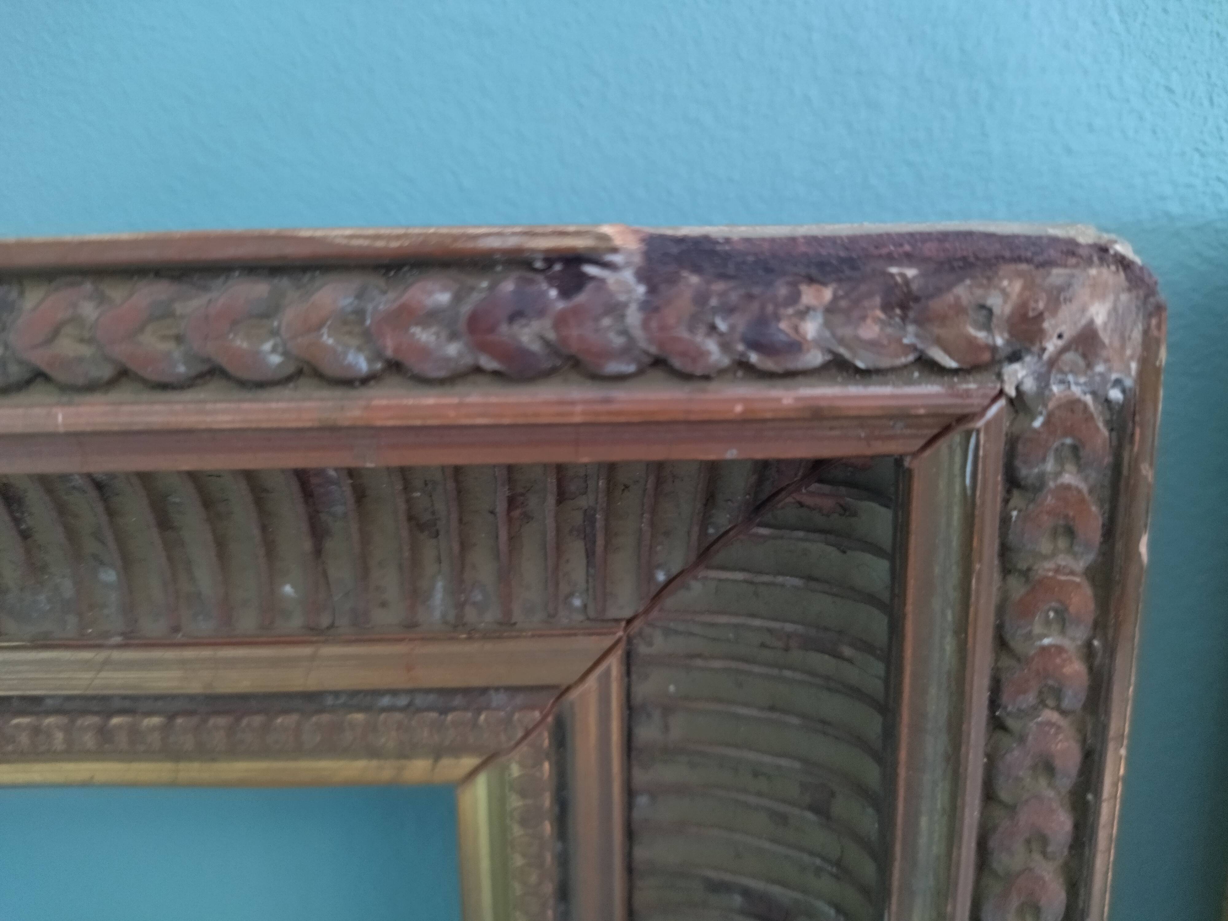 Pair of frames in old carved wood