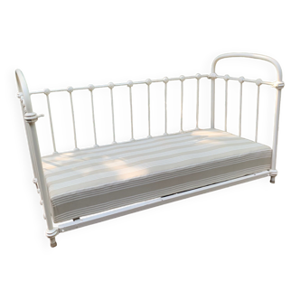 Wrought iron sofa bed with box spring.