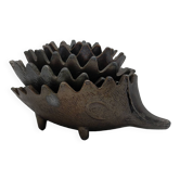 Nesting metal hedgehog ashtrays.