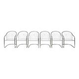6 chrome metal chairs in the style of Gastonne Ronaldo.