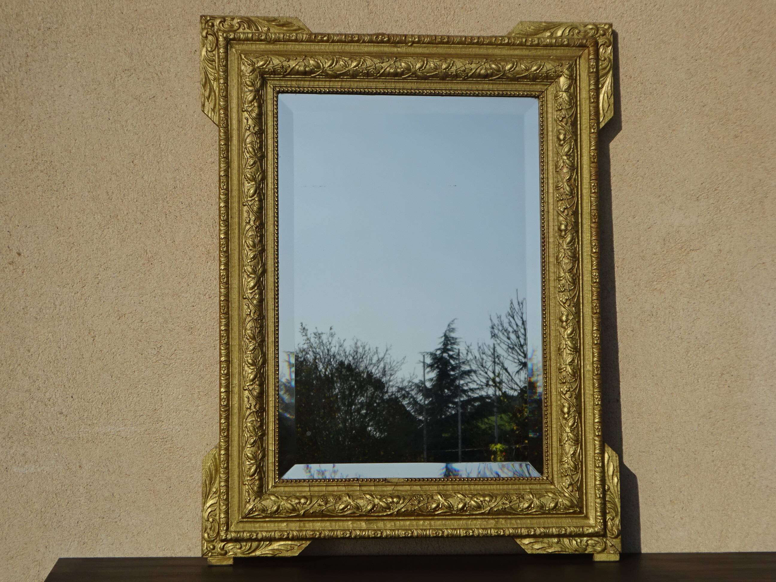 Antique wooden mirror with gilded stucco 65x83cm