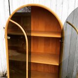 Curved bamboo and blond rattan library