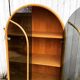 Curved bamboo and blond rattan library