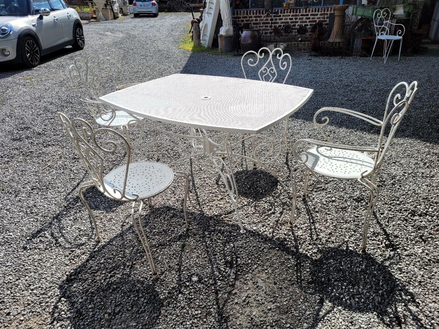 Old wrought iron garden furniture, table + 2 armchairs + 2 chairs