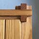 Modernist pine side table / bedside table, 1970 design.