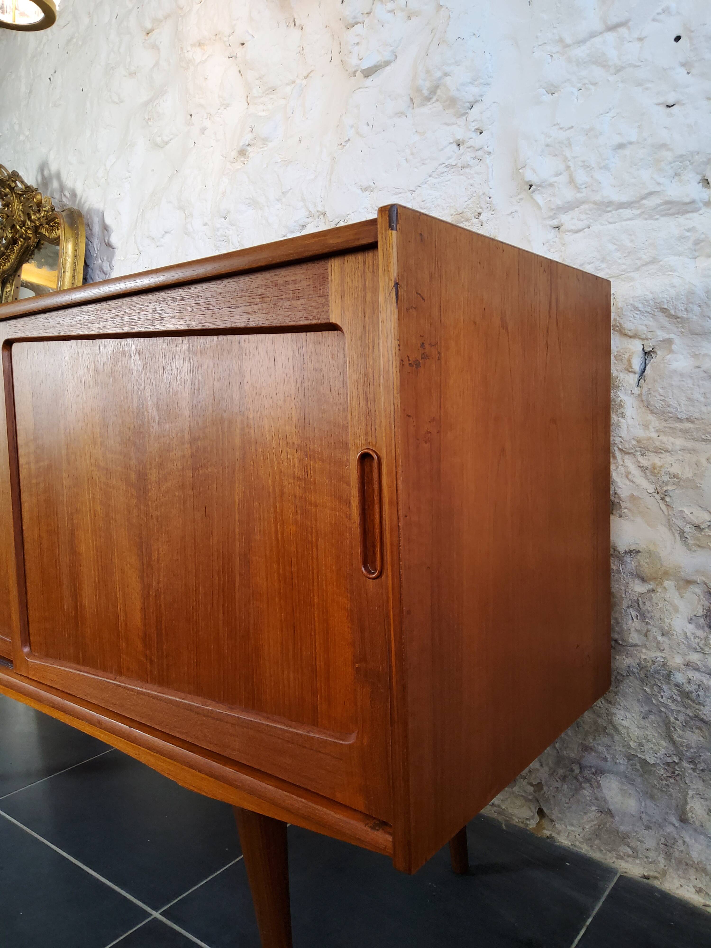 Scandinavian sideboard with sliding doors and drawers - teak