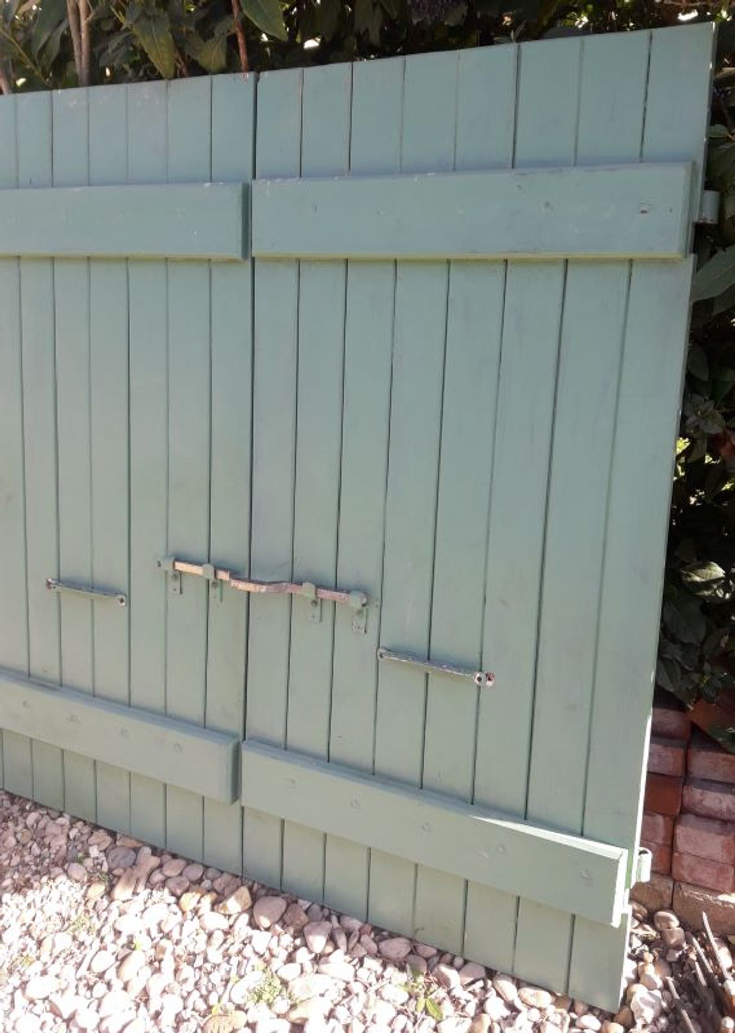 Pair of wooden iron hanging shutters