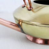 Watering can in brass and copper
