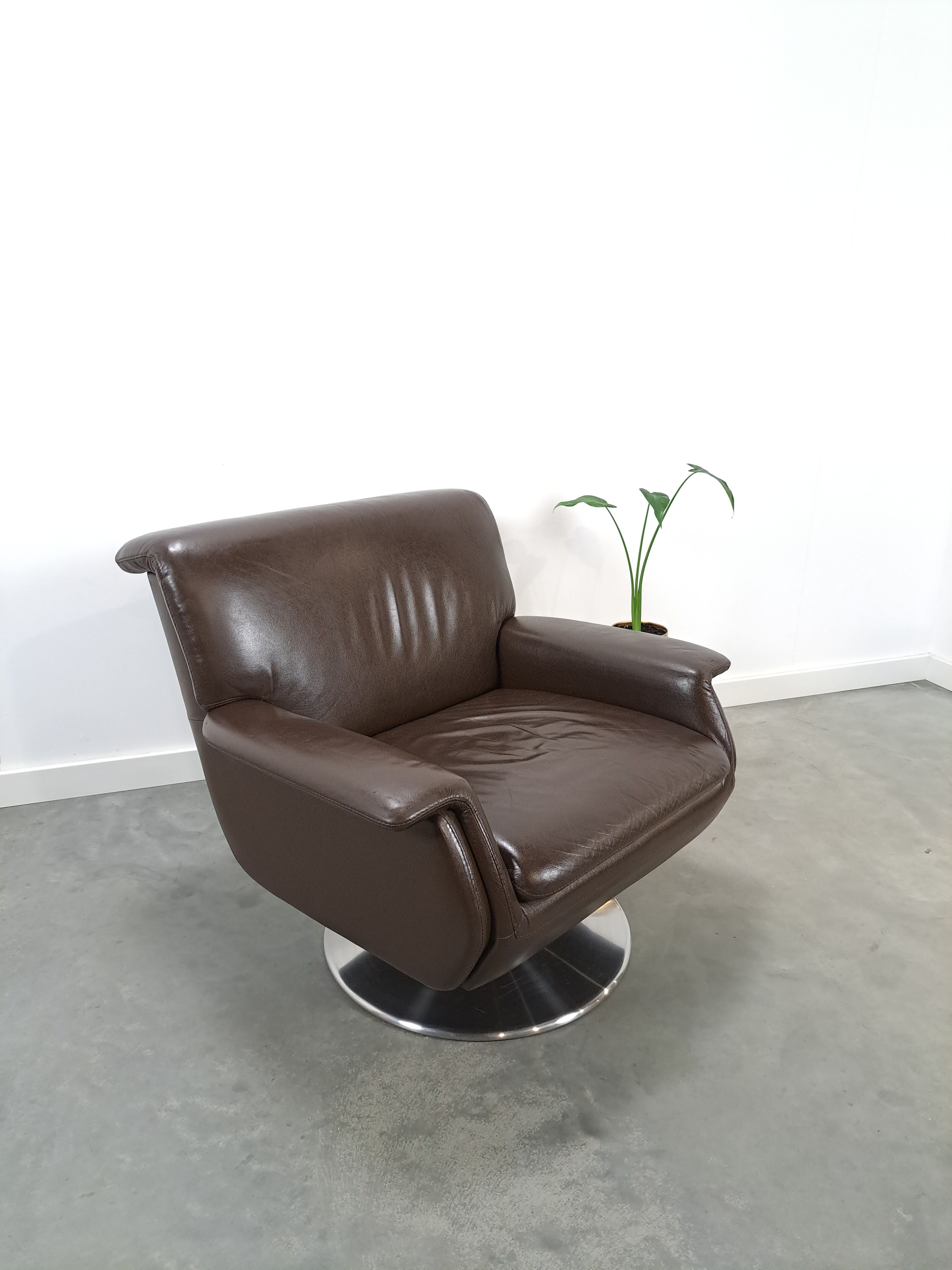 Brown leather swivel chair