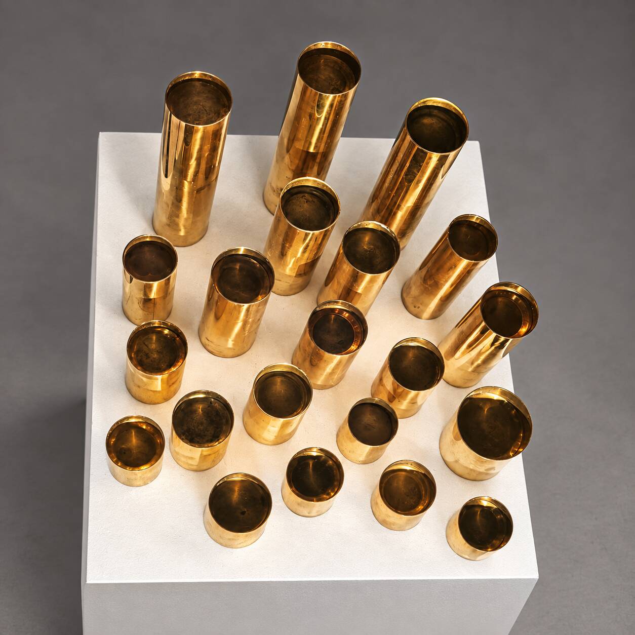 Collection of 21 modular brass candle holders — Colseth, Norway, circa 1960–70