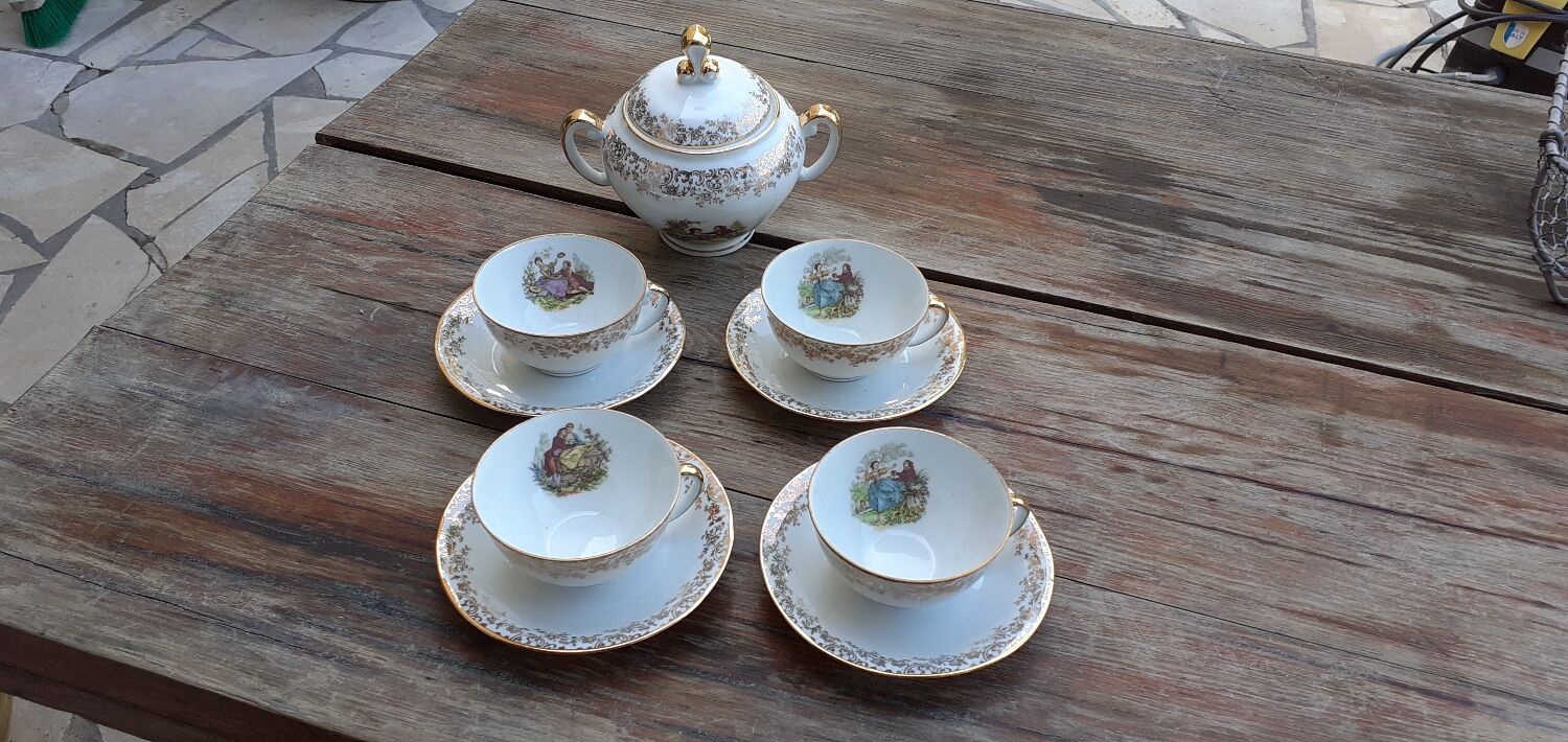 Set of 4 cups and sugar bowl Haute porcelaine de Berry