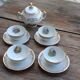 Set of 4 cups and sugar bowl Haute porcelaine de Berry
