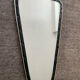 Asymmetrical mirror from the 1960s.