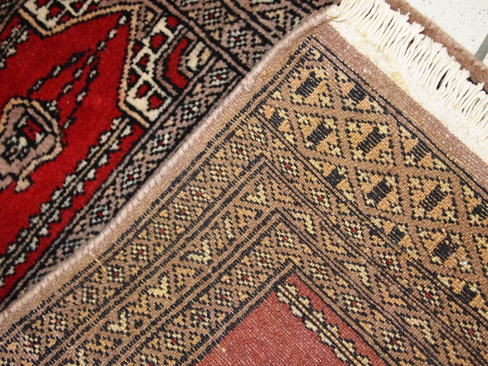 Tapis vintage fait main Bukhara de prière en laine rouge (45cm x 101cm)