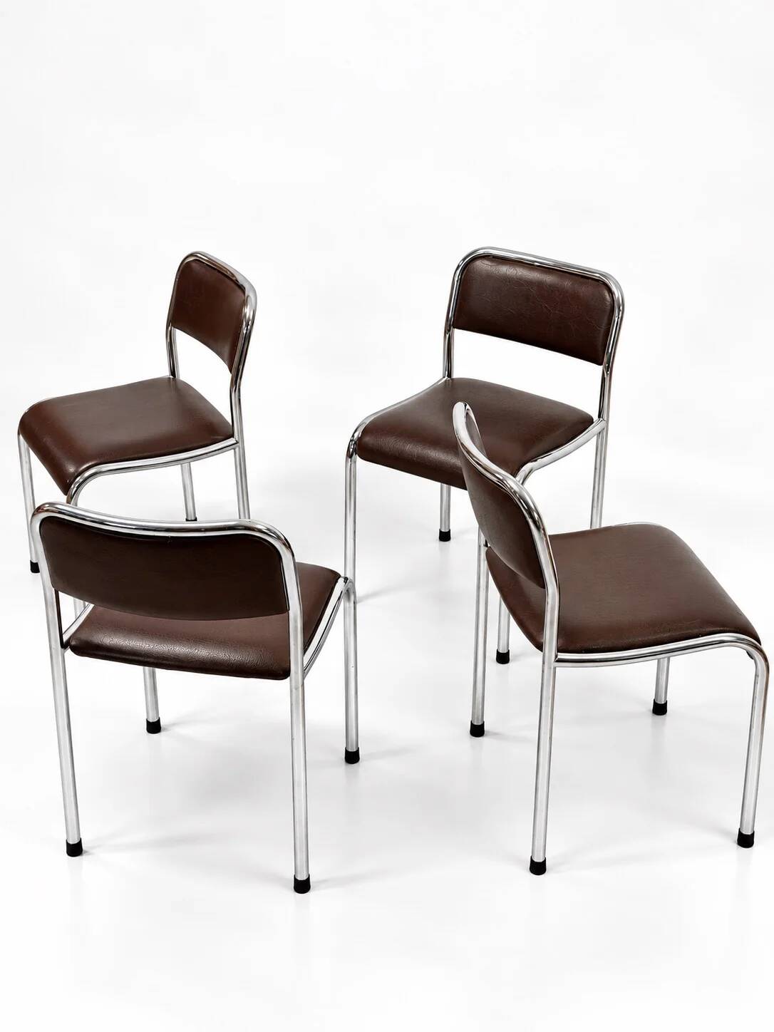 Set of 4 vintage dining chairs in chrome, brown faux leather, 1970s.