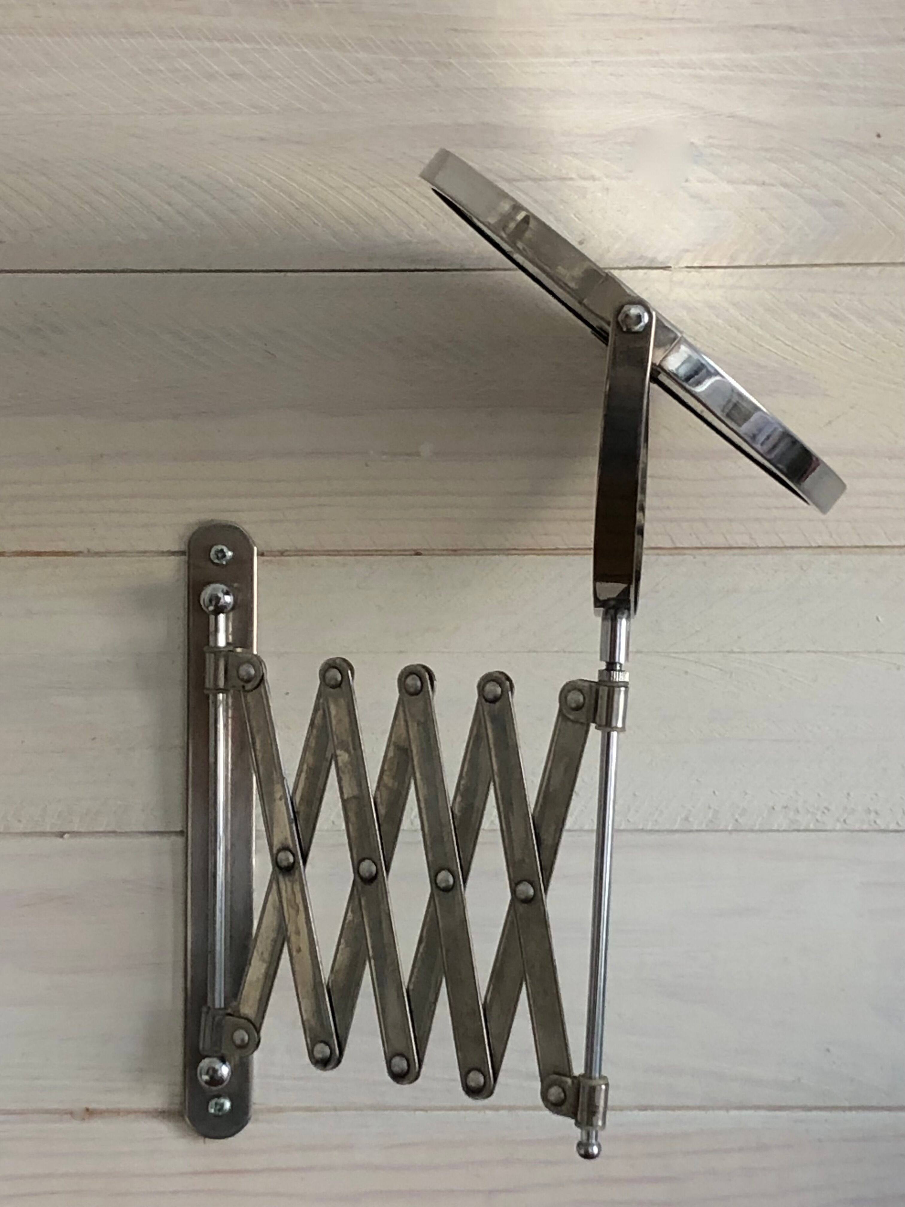 Extendable wall mirror