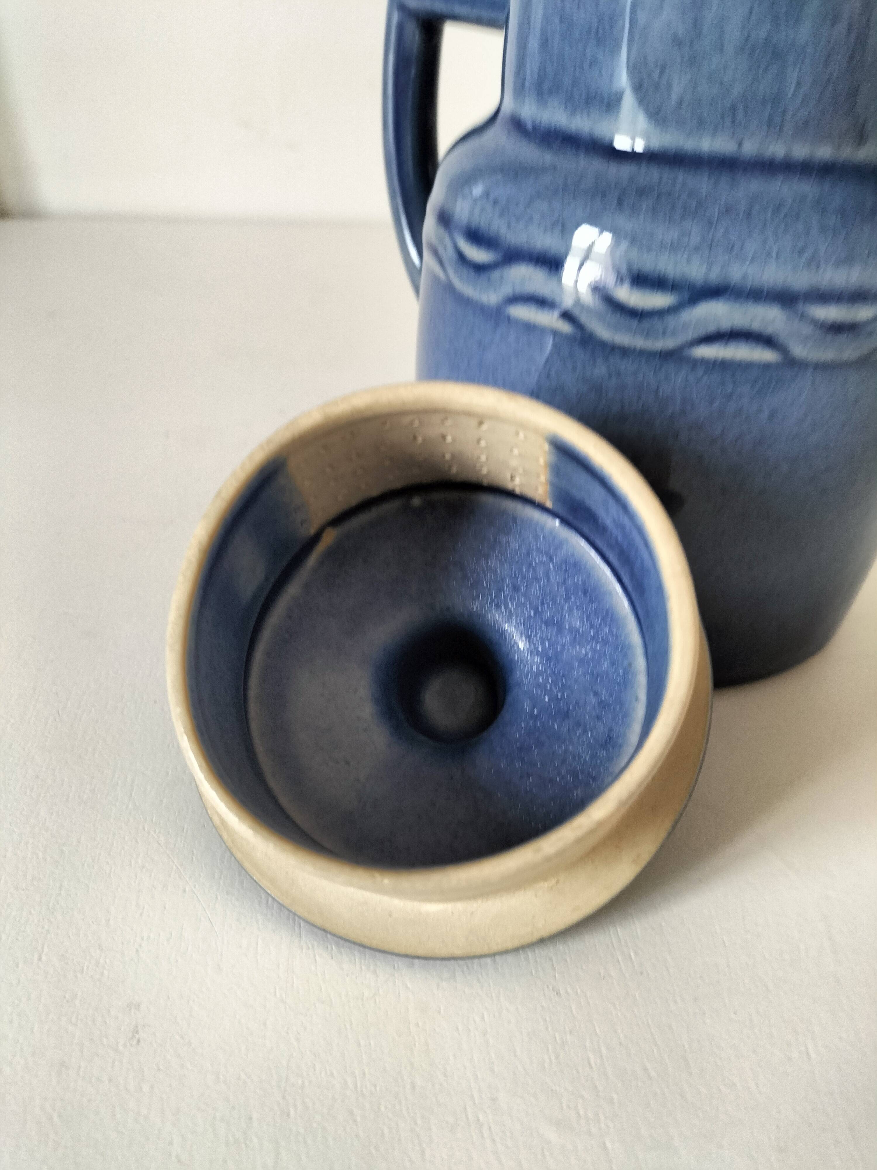 Blue speckled stoneware jug with integrated filter