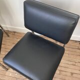 Black leather armchairs