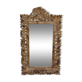 Mirror with its openwork frame