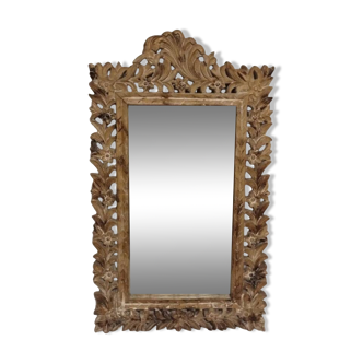 Mirror with its openwork frame