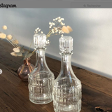 2 small bottles / glass bottles with caps