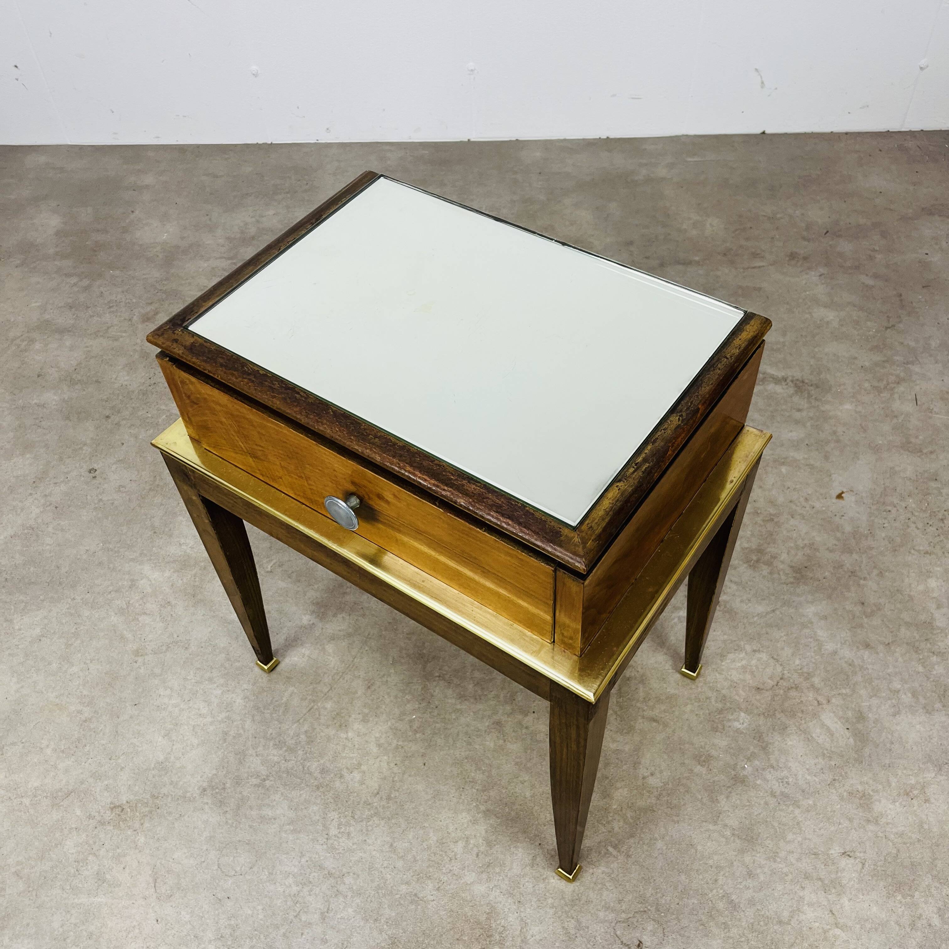 Art Deco mirror and brass bedside table