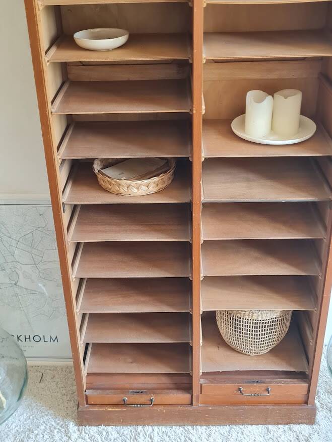 Vintage double curtain filing cabinet.