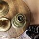 Set of three solid brass candle holders