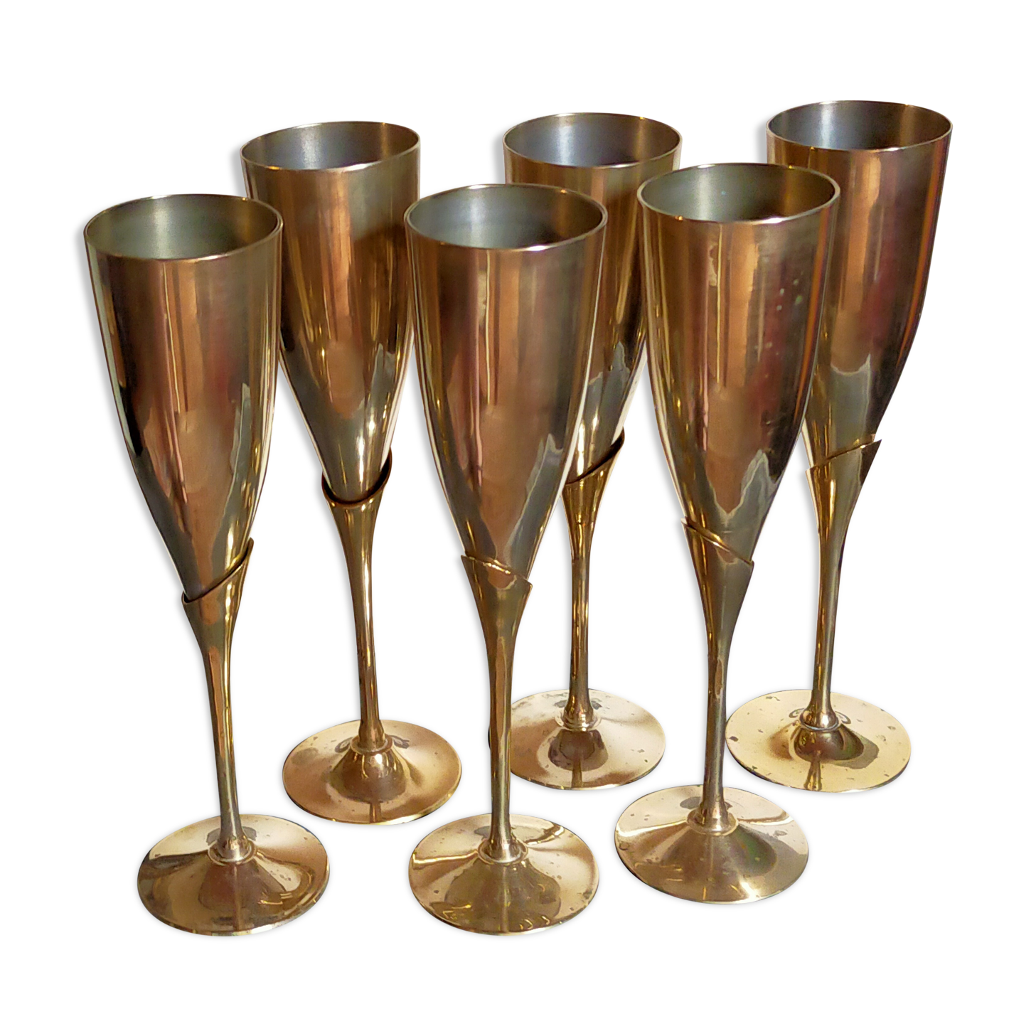 Six brass champagne coupes