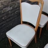 series of 8 vintage skai and wood chairs
