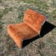Chrome steel armchair and orange fabric by Vittorio Introini