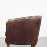 Sheep leather club chair finished with black piping
