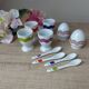 Set of 4 egg cups with spoons, colourful vintage salt and pepper shakers.