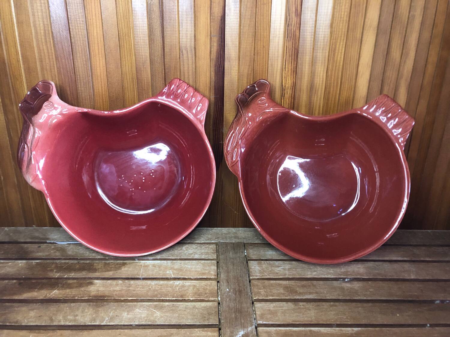 Pair of red ceramic hen dish