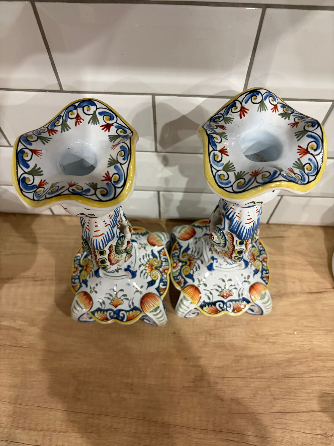 Set of two old Rouen candlesticks.