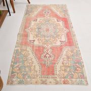 Tapis turc médaillon rouge