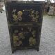 Lacquered wooden Chinese cabinet