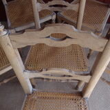 Suite of oak chairs; canated seats