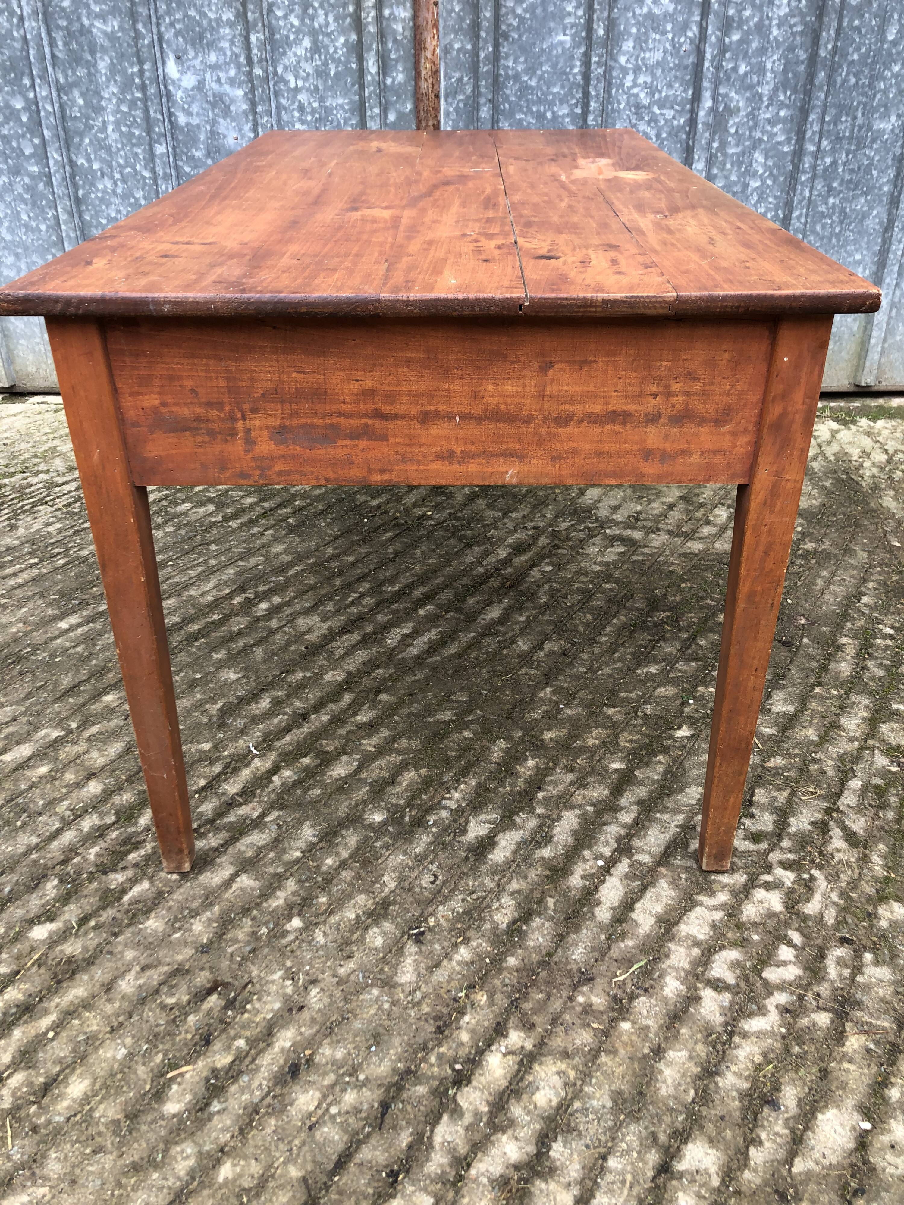 Poplar wood table with 2 front drawers from the Reconstruction period.