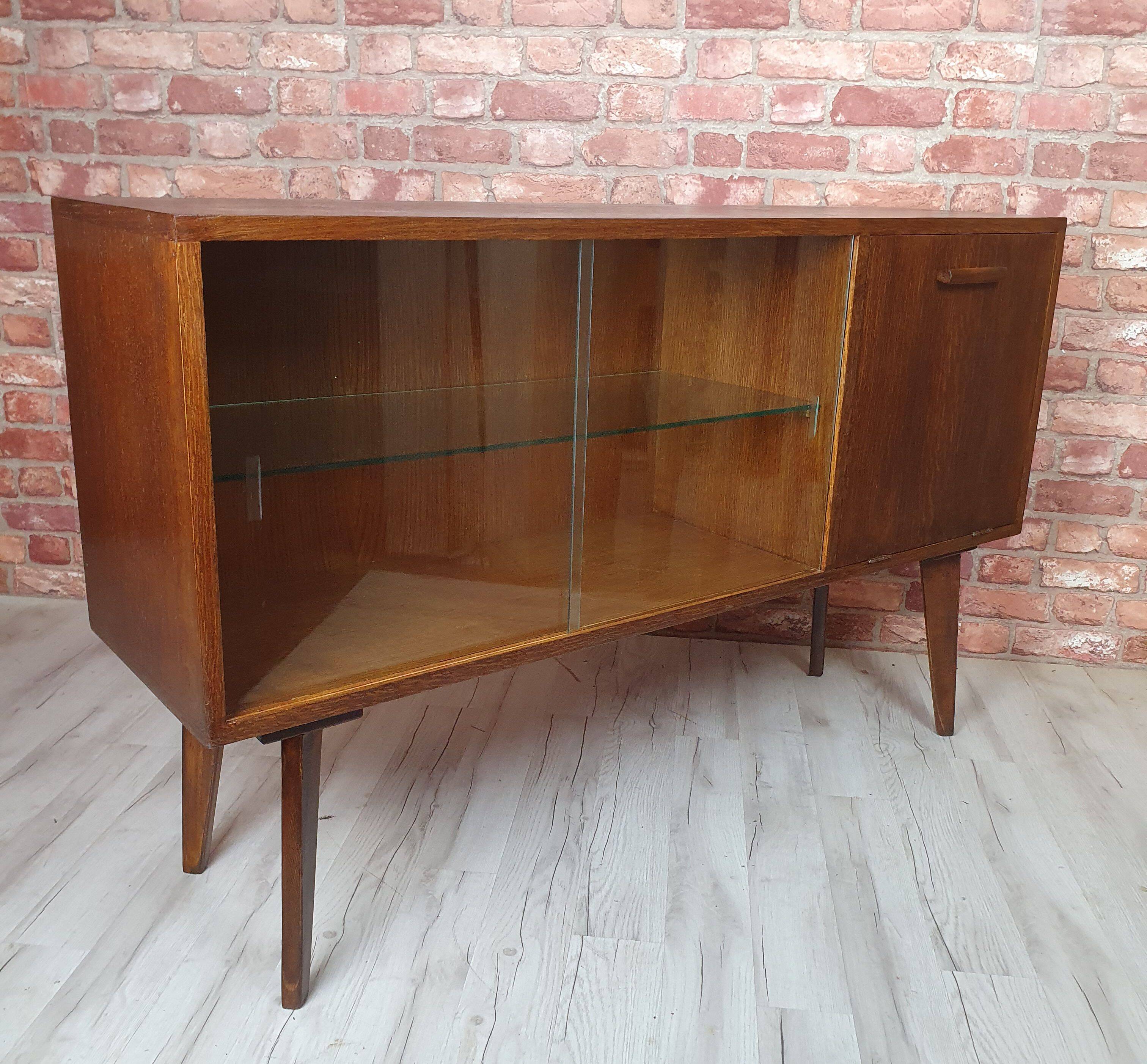 Renovated oak display cabinet with a bar on slanted legs